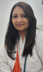 Dr. Puja Prasad, Gynaecologist with stethoscope